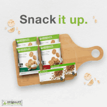 a wooden cutting board with herbalife nutrition products on it