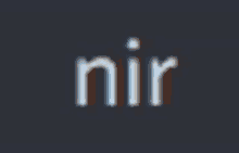 a blurred image of the word nir on a dark background .