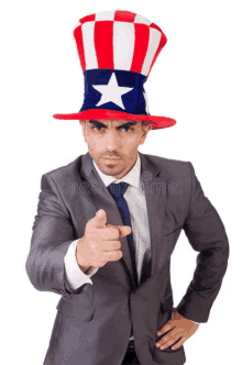 a man in a suit and tie wearing an uncle sam hat points at the camera