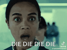 a woman with a surprised look on her face says die die die die