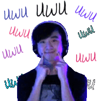 a man wearing headphones is surrounded by a bunch of letters that say uwu