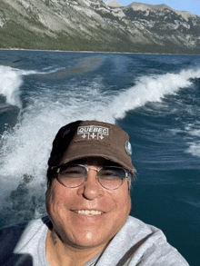 a man wearing a brown hat that says quebec