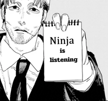 a man in a suit and tie is holding a notepad that says " ninja is listening "