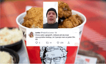 a bucket of fried chicken is next to a twitter post