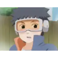 a young boy wearing goggles and headphones is making a funny face .