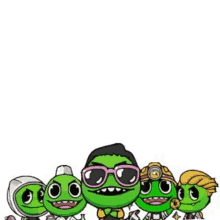 a group of green cartoon characters are posing for a picture .