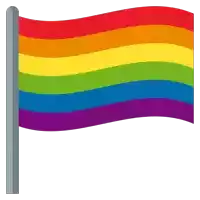 a rainbow flag is waving in the wind on a pole