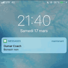 a phone screen with a message from oumar coach