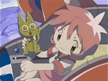 a cartoon girl is holding a green cat with big eyes