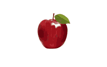 a red apple with a green leaf on top of it