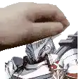 a hand is picking up a piece of paper from a pile of garbage .