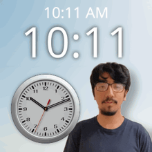 a man stands in front of a wall clock that says 10:11 am