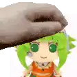 a little girl with green hair and headphones is being held by a person .