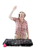 a woman wearing headphones is standing in front of a pioneer dj controller