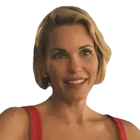a woman in a red tank top is smiling