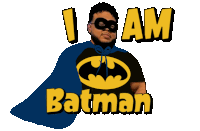 a man with a cape and a batman t-shirt says i am batman