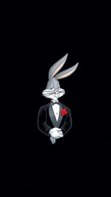 bugs bunny is wearing a tuxedo with a red rose in his pocket .