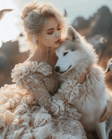 a woman in a white dress holds a husky dog