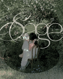 a woman sits in a chair in the grass reading a book with the word sage above her