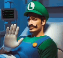 a man in a hospital bed dressed as luigi from mario bros