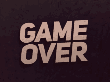 a purple background with the words game over on it