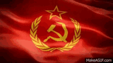 a red flag with a hammer and sickle and a star on it .