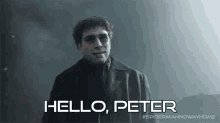 a man in a trench coat is standing in a dark room and says `` hello , peter '' .