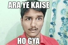 a man with a mustache is wearing a red shirt and has the words ara ye kaise ho gya above his head