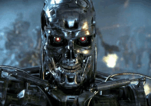 a close up of a robot with red eyes and a skull