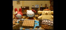 a video of hello kitty my melody and pompompurin eating cookies