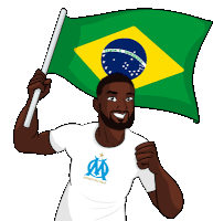 a man wearing a white shirt that says droit au but holds a brazilian flag