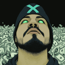 a man wearing a black hat with a blue x on it looks up at a pile of money