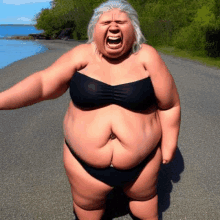 a very fat woman in a bikini is standing on a beach screaming .