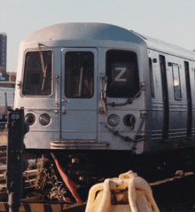 a silver train with the letter z on it