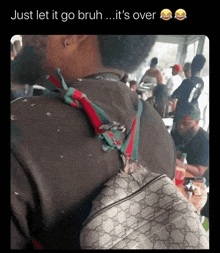 a picture of a man with a gucci backpack on his back