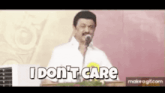 a man is giving a speech at a podium and saying `` i don 't care '' .