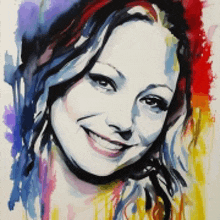 a colorful painting of a woman 's face with a smile on her face