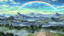 a rainbow is visible over a mountain range