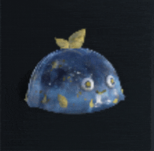 a blue blob with a yellow leaf on top of it .