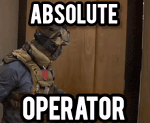 a man in a helmet is standing in front of a door with the words " absolute operator " written on it