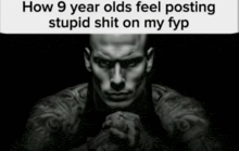 a black and white photo of a man with tattoos on his arms