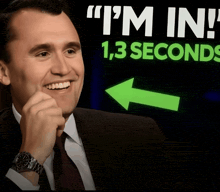 a man is smiling in front of a sign that says " i 'm in " 1.3 seconds