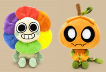 a stuffed flower and a stuffed pumpkin sit side by side