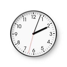a black and white clock with the hands on the numbers 10 and 12