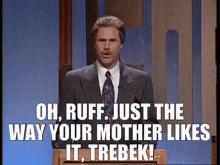 a man in a suit and tie is giving a speech and says oh ruff just the way your mother likes it trebek !