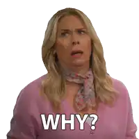 a woman wearing a pink sweater and a scarf says why