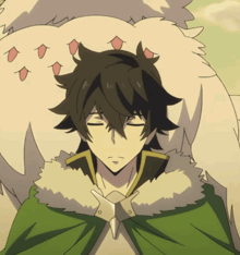a man in a green cape is sleeping next to a large white animal