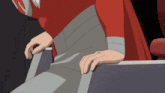 a cartoon character is sitting in a chair with a red cape on