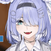 a close up of a girl with blue hair