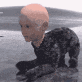 a baby with a bald head is crawling on a concrete surface .